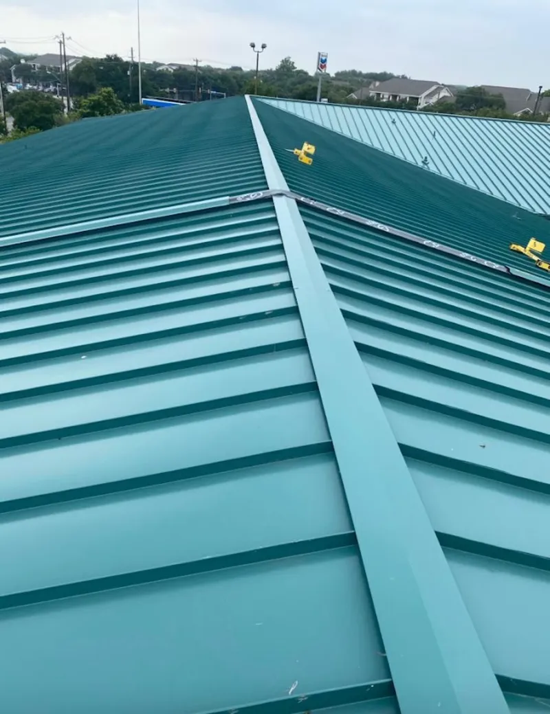 Green commercial metal roof ridge and valley for Metal Roof Repair in Colesville